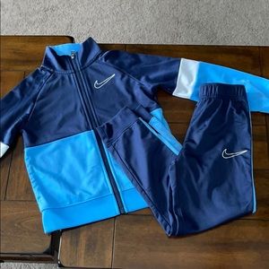 Boys size 7/L NIKE blue long sleeve track suit